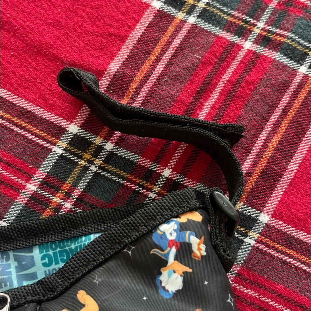 Disney Parks Stroller Organizer featuring an allover character print. GUC